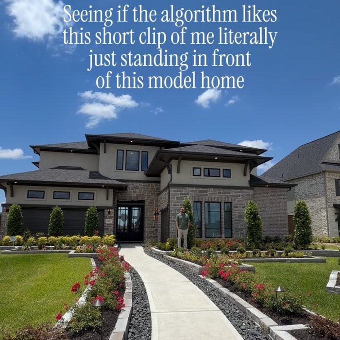 In front of a Houston model home